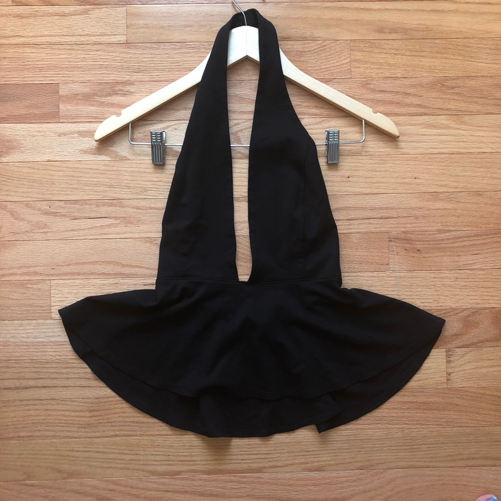 Black low cut front and open back peplum top